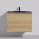 A modern 26-inch wall-mounted bathroom vanity with a light oak wood grain finish and a matte black integrated sink basin and faucet, shown against a neutral light gray wall.
