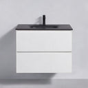 A modern 26-inch wall-mounted bathroom vanity with a matte white cabinet and a matte black countertop, integrated sink, and black faucet, shown against a light gray wall.