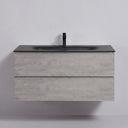 A modern floating 42-inch bathroom vanity with a textured light stone gray concrete-look cabinet and a matte black integrated sink and faucet, shown against a plain light gray wall.