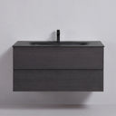 A modern floating 42-inch bathroom vanity with a matte black oak wood grain finish, featuring a built-in matte black rectangular sink and a matching matte black faucet, shown against a plain light gray wall.