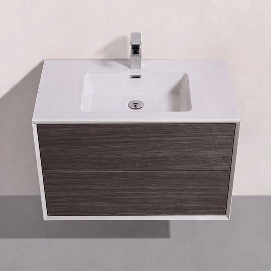 A modern wall-mounted bathroom vanity with a white rectangular basin and a dark brown graphite wood-grain front cabinet, paired with a chrome faucet, shown against a light beige wall and gray floor.