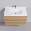 A modern 34-inch wall-mounted bathroom vanity with a matte white integrated sink and chrome faucet, paired with a light natural oak wood cabinet, shown against a plain light gray wall.
