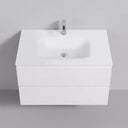 A modern matte white 34-inch wall-mounted bathroom vanity with an integrated sink and a single chrome faucet, shown against a plain light gray wall.
