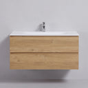 A modern 42-inch wall-mounted bathroom vanity with a light oak wood grain cabinet, a matte white integrated sink countertop, and a chrome faucet, shown against a neutral gray background.