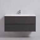A modern 42-inch floating bathroom vanity with a dark charcoal black oak wood-grain drawer front, a matte white integrated sink countertop, and a chrome faucet, shown against a light gray wall.