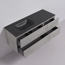 Modern wall-mounted 52-inch bathroom vanity with a matte black countertop and off centered integrated sink, paired with textured light stone gray drawer fronts and open lower drawers, shown against a plain light gray wall and floor.