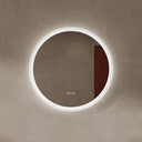 BAI 21011 modern minimalist round 30-inch bathroom vanity mirror with a glowing white LED light ring, mounted on a textured beige plaster wall.