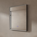BAI 21021 modern rectangular 30-inch wall-mounted mirror with a slim LED light switched off and a black frame, shown against a textured beige wall. The mirror has small control touch sensor dots near the bottom center.