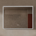 BAI 21024 modern rectangular 47-inch wall-mounted mirror with a slim white LED light and a black frame, shown against a textured beige wall. The mirror has small control touch sensor dots near the bottom center.