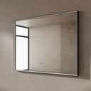 BAI 21024 modern rectangular 47-inch wall-mounted mirror with a slim LED light switched off and a black frame, shown against a textured beige wall. The mirror has small control touch sensor dots near the bottom center.