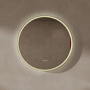 BAI 21051 modern minimalist round 32-inch bathroom vanity mirror with a glowing warm LED light ring and a gold frame, mounted on a textured beige plaster wall.