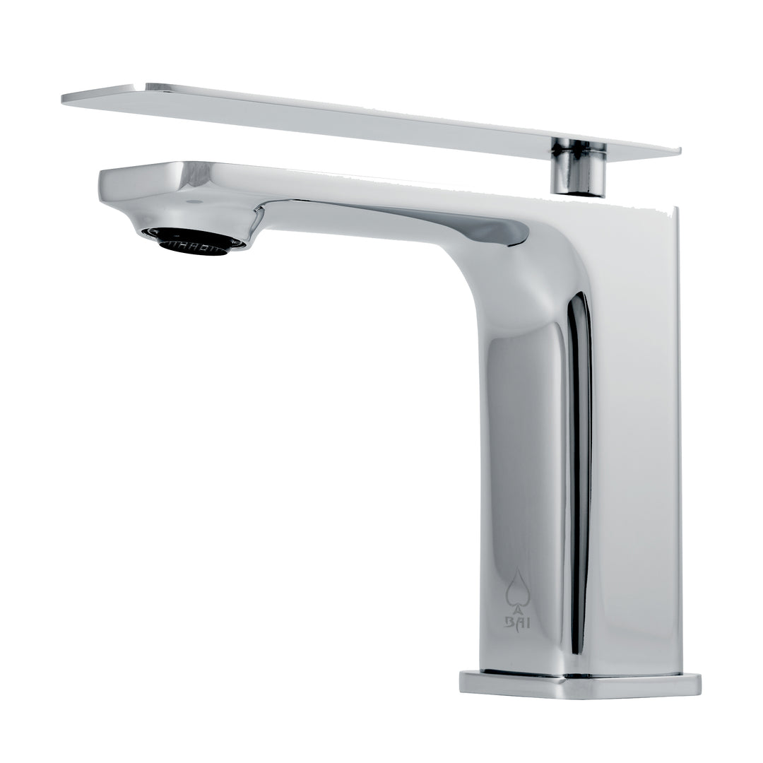 A modern single-handle bathroom faucet with a polished chrome finish, featuring a rectangular spout, a flat deck plate, and a built-in drain, shown against a plain light gray background.