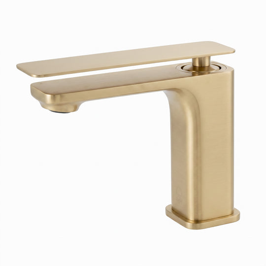 A modern single-handle bathroom faucet in a brushed gold finish, shown from a three-quarter angle on a solid white background.