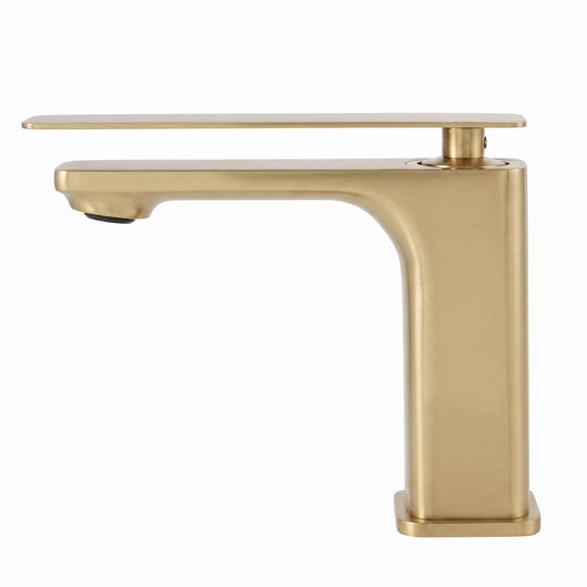 A modern single-handle bathroom faucet in a brushed gold finish, shown from a side profile against a solid white background.