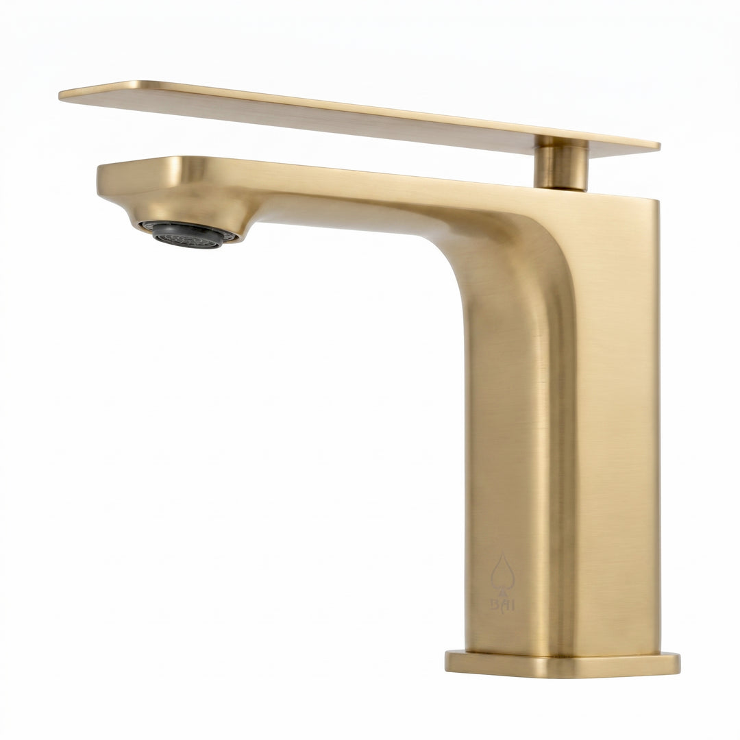 A modern single-handle bathroom faucet in brushed gold finish with a flat deck plate, shown against a solid white background.