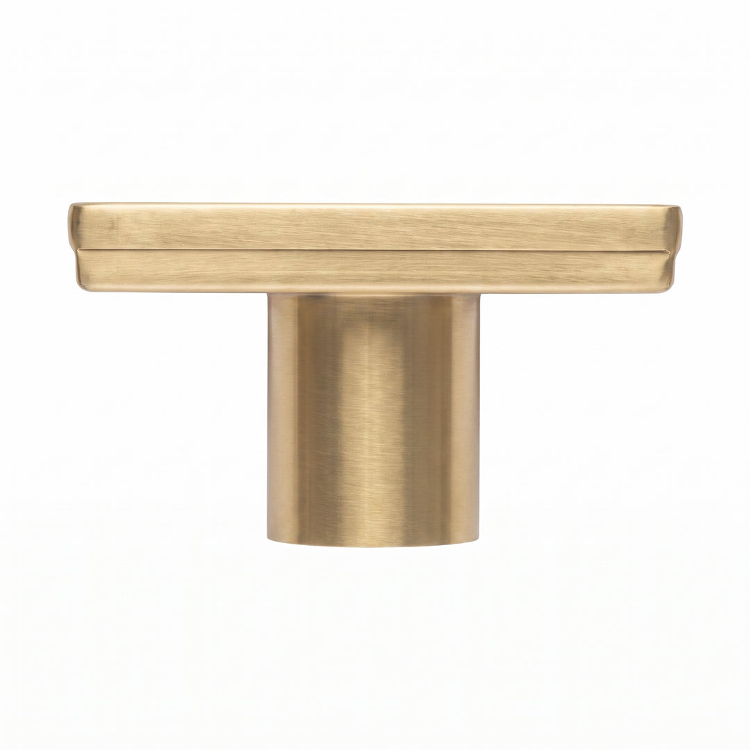A square shower drain with a brushed gold finish, shown from the side on a solid white background.