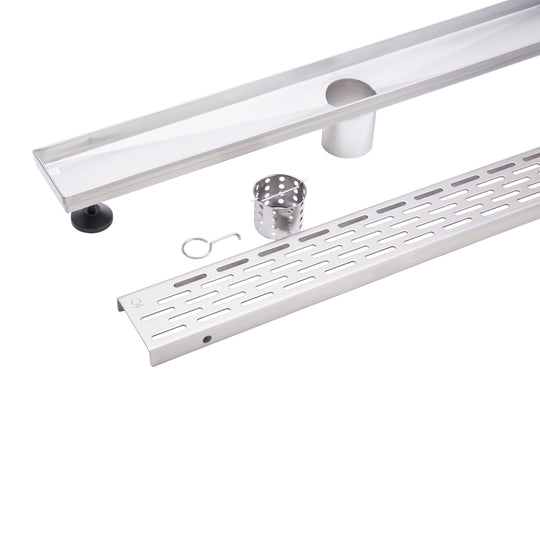 A stainless steel outdoor shower drain channel kit with a long channel trough, a perforated drain grate, a mounting bracket, a small metal cup, and a small hook, displayed on a clean white background.