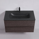 A modern floating 42-inch bathroom vanity in a graphite wood finish with a matte black integrated sink and a matching matte black faucet, set against a clean light gray background.