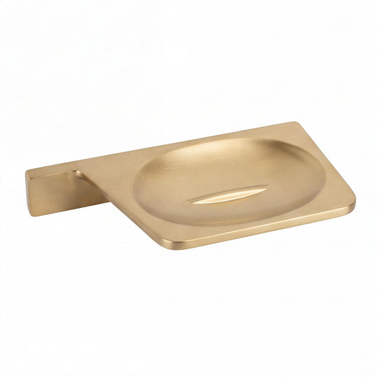 A brushed gold wall-mounted soap dish with a rectangular basin and a flat mounting bracket on the left, shown on a plain white background.