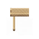 A modern wall-mounted brushed gold toilet paper holder with a textured cylindrical roll holder and a U-shaped support arm, shown in a side view profile against a plain white background.