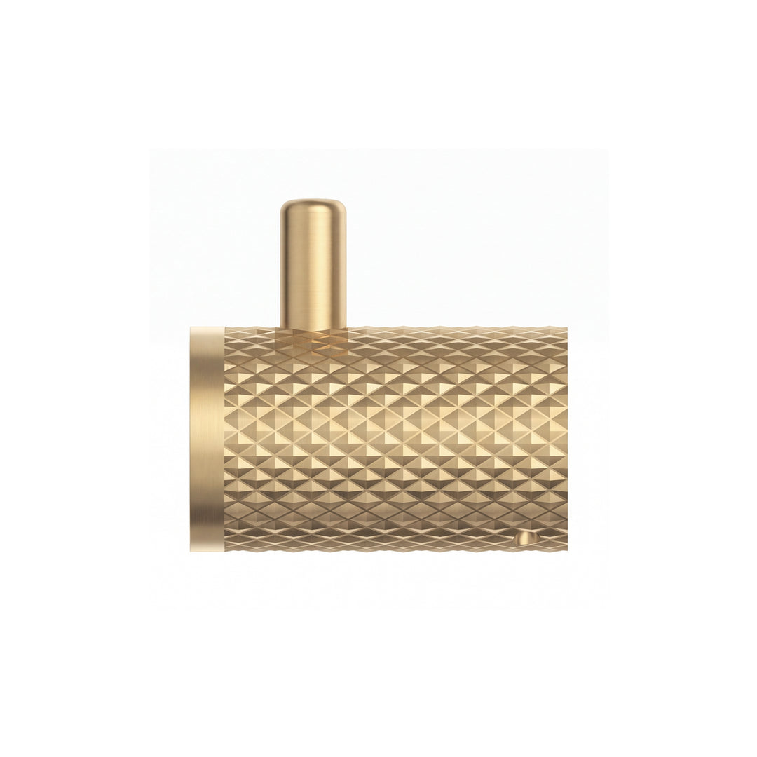 A brushed gold wall-mounted cylindrical robe hook with a textured, diamond-patterned side and a smooth circular front plate, shown on a plain white background.