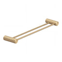 A modern wall-mounted double towel bar in brushed gold with textured cylindrical wall mounts on either end, shown against a plain white background.