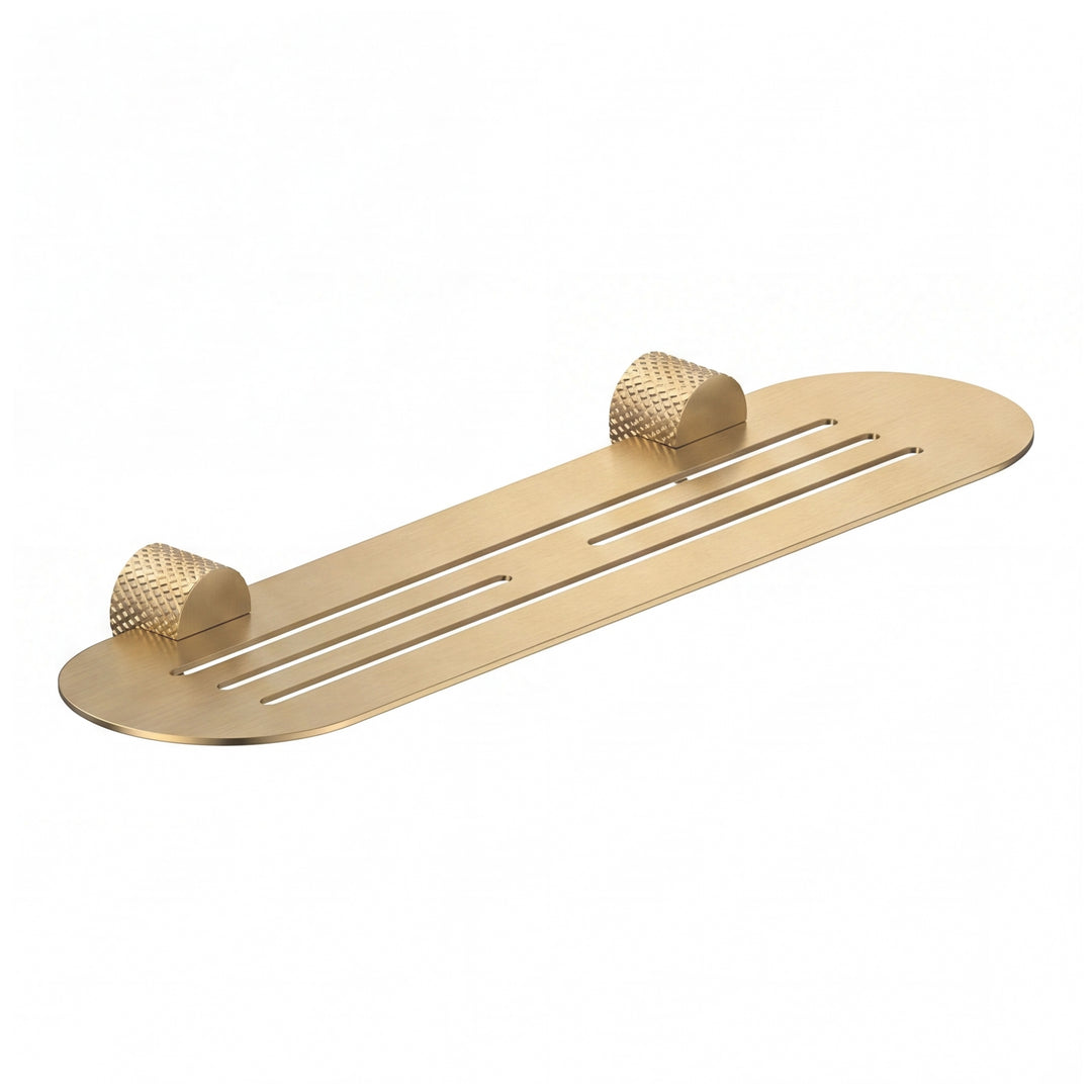A modern transitional brushed gold wall-mounted bathroom shelf with two knurled hook holders on a solid white background.