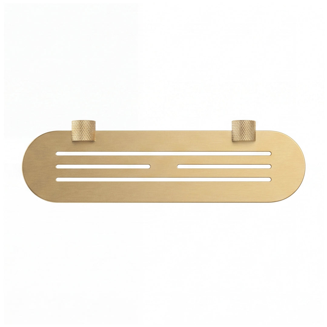 A modern transitional brushed gold wall-mounted bathroom shelf with two knurled hook holders on a solid white background.
