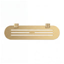 A modern transitional brushed gold wall-mounted bathroom shelf with two knurled hook holders on a solid white background.