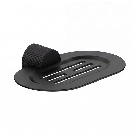 A modern wall-mounted matte black metal oval soap dish with a textured, diamond-patterned hanger, shown on a clean white background.