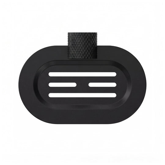 A modern wall-mounted matte black metal oval soap dish with a textured, diamond-patterned hanger, shown on a clean white background.