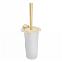 A modern wall mounted toilet brush with a brushed gold metal handle, base, and lid, set against a plain white background.