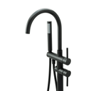 A modern freestanding bathtub faucet set in a matte black finish, featuring a tall curved gooseneck spout, a vertical support column with a round base, a slide valve, and a handheld shower head with a flexible hose, shown on a plain white background.
