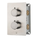 A wall-mounted two-handle thermostatic shower mixing valve trim with a brushed nickel faceplate, round control knobs, and brass connection ports on the side.