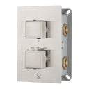 A modern two-handle thermostatic shower mixing valve trim set with a brushed nickel faceplate, featuring square lever knobs and brass mounting hardware on a white background.